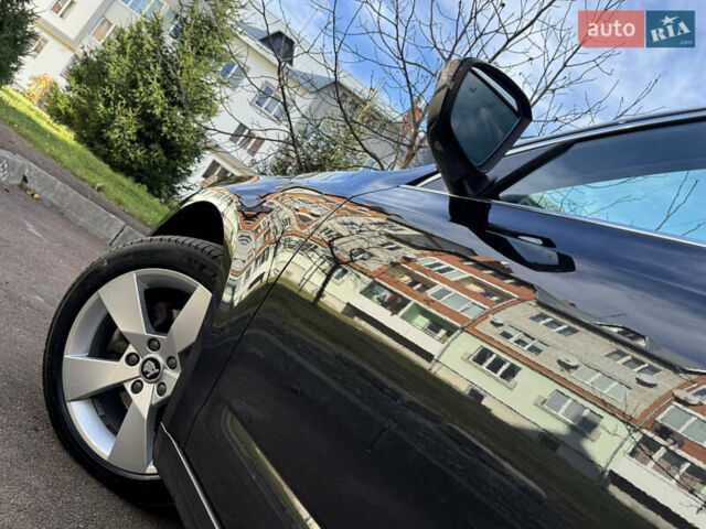 Чорний Шкода Октавія, об'ємом двигуна 2 л та пробігом 218 тис. км за 15299 $, фото 80 на Automoto.ua