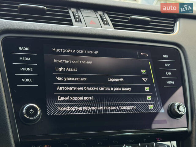 Чорний Шкода Октавія, об'ємом двигуна 2 л та пробігом 218 тис. км за 15299 $, фото 116 на Automoto.ua