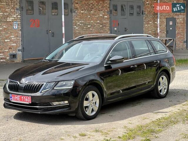 Черный Шкода Октавия, объемом двигателя 1.5 л и пробегом 239 тыс. км за 12350 $, фото 2 на Automoto.ua