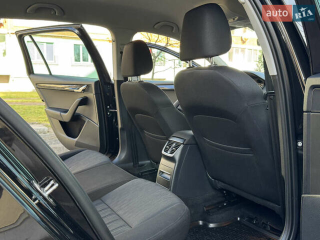 Чорний Шкода Октавія, об'ємом двигуна 2 л та пробігом 218 тис. км за 15299 $, фото 150 на Automoto.ua