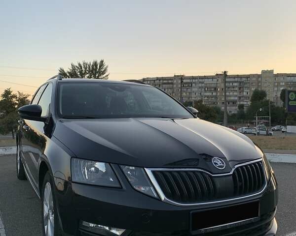 Черный Шкода Октавия, объемом двигателя 1.6 л и пробегом 174 тыс. км за 14900 $, фото 2 на Automoto.ua