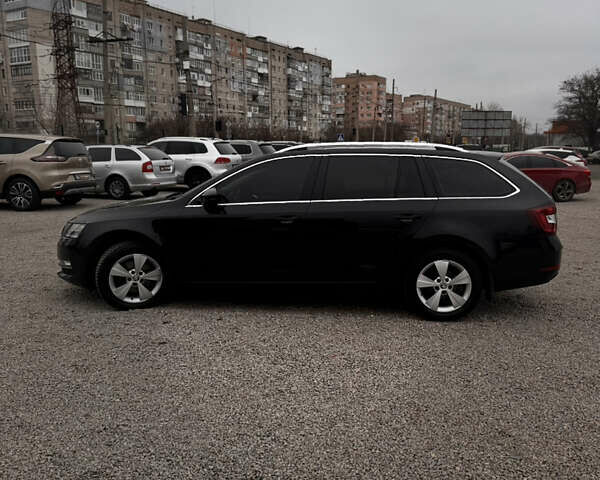 Черный Шкода Октавия, объемом двигателя 2 л и пробегом 153 тыс. км за 18700 $, фото 2 на Automoto.ua