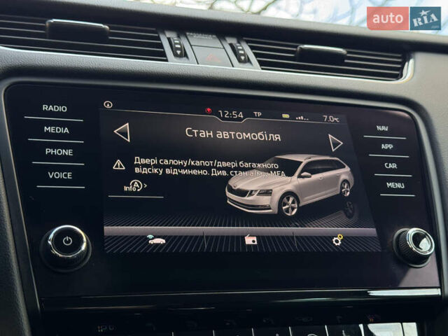 Чорний Шкода Октавія, об'ємом двигуна 2 л та пробігом 218 тис. км за 15299 $, фото 110 на Automoto.ua