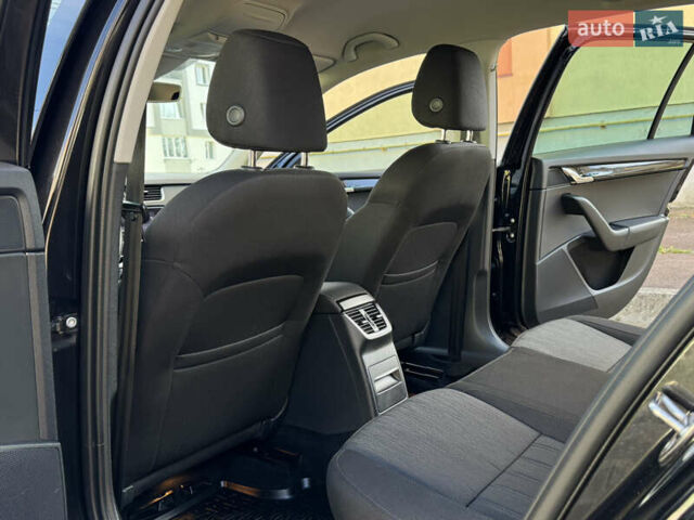 Чорний Шкода Октавія, об'ємом двигуна 2 л та пробігом 218 тис. км за 15299 $, фото 140 на Automoto.ua