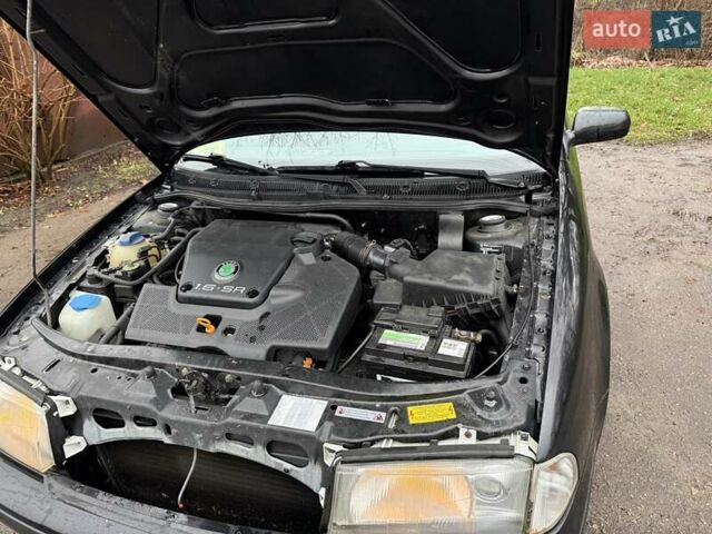 Черный Шкода Октавия, объемом двигателя 1.6 л и пробегом 235 тыс. км за 3450 $, фото 7 на Automoto.ua