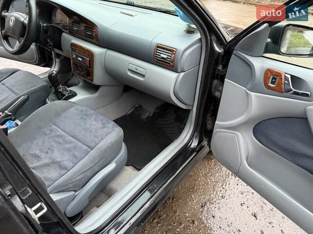 Черный Шкода Октавия, объемом двигателя 1.6 л и пробегом 235 тыс. км за 3450 $, фото 15 на Automoto.ua