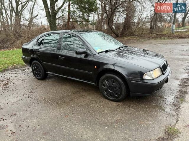Черный Шкода Октавия, объемом двигателя 1.6 л и пробегом 235 тыс. км за 3450 $, фото 3 на Automoto.ua