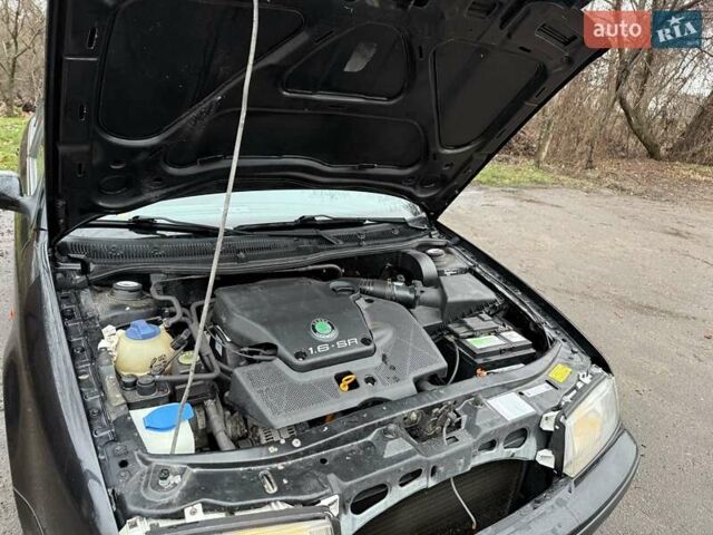 Черный Шкода Октавия, объемом двигателя 1.6 л и пробегом 235 тыс. км за 3450 $, фото 6 на Automoto.ua