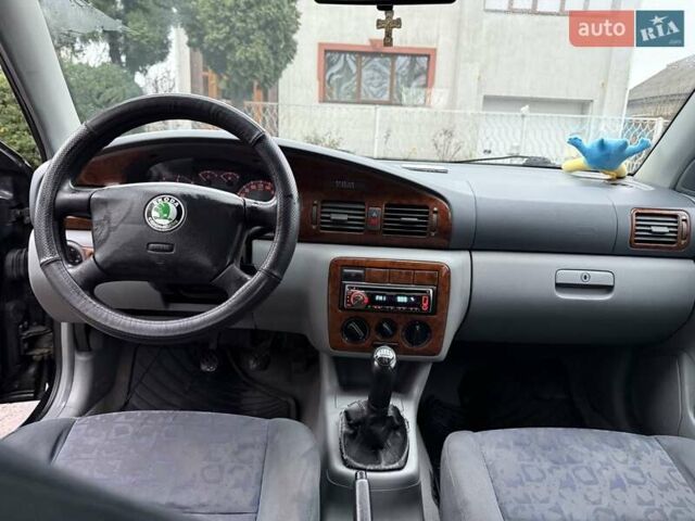 Черный Шкода Октавия, объемом двигателя 1.6 л и пробегом 235 тыс. км за 3450 $, фото 11 на Automoto.ua