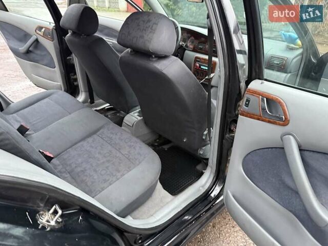 Черный Шкода Октавия, объемом двигателя 1.6 л и пробегом 235 тыс. км за 3450 $, фото 16 на Automoto.ua