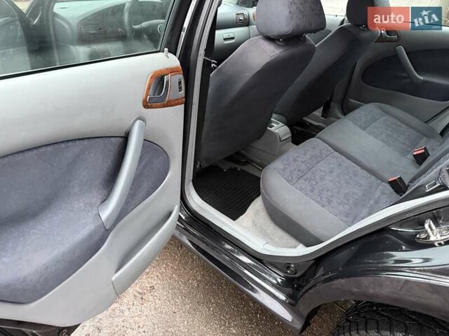 Черный Шкода Октавия, объемом двигателя 1.6 л и пробегом 235 тыс. км за 3450 $, фото 14 на Automoto.ua