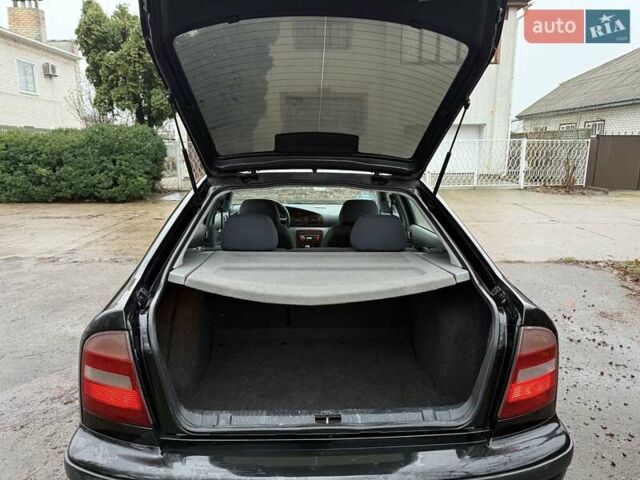 Черный Шкода Октавия, объемом двигателя 1.6 л и пробегом 235 тыс. км за 3450 $, фото 8 на Automoto.ua