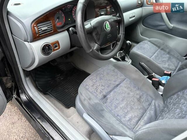 Черный Шкода Октавия, объемом двигателя 1.6 л и пробегом 235 тыс. км за 3450 $, фото 12 на Automoto.ua