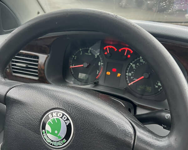 Черный Шкода Октавия, объемом двигателя 1.6 л и пробегом 161 тыс. км за 2700 $, фото 7 на Automoto.ua