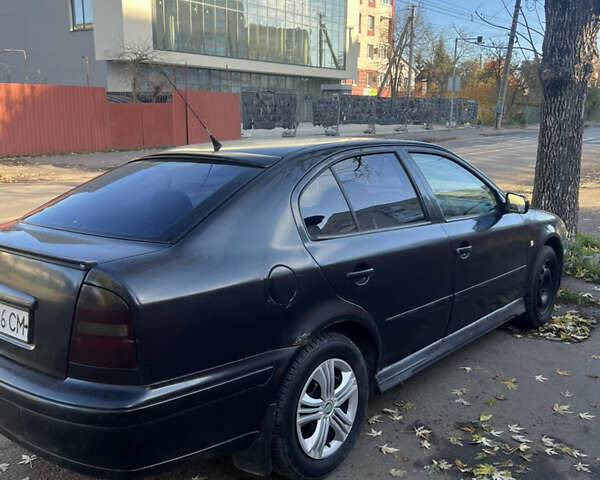 Черный Шкода Октавия, объемом двигателя 1.6 л и пробегом 200 тыс. км за 2300 $, фото 4 на Automoto.ua
