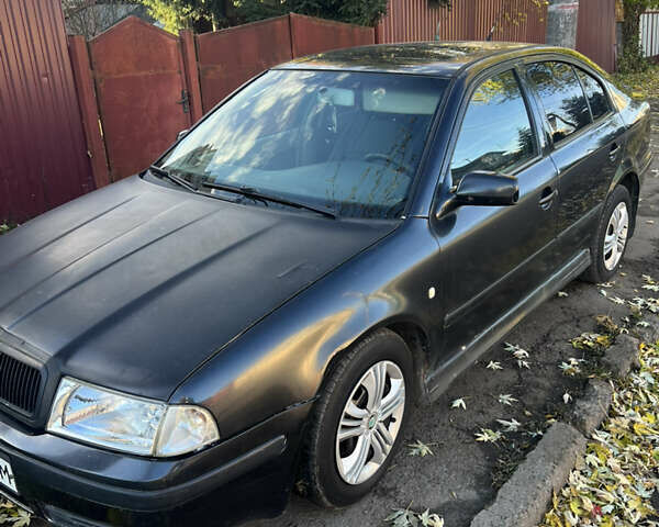 Черный Шкода Октавия, объемом двигателя 1.6 л и пробегом 200 тыс. км за 2300 $, фото 1 на Automoto.ua