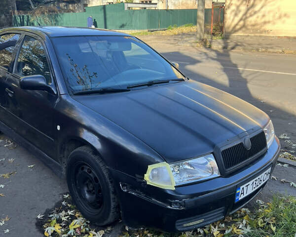 Черный Шкода Октавия, объемом двигателя 1.6 л и пробегом 200 тыс. км за 2300 $, фото 2 на Automoto.ua