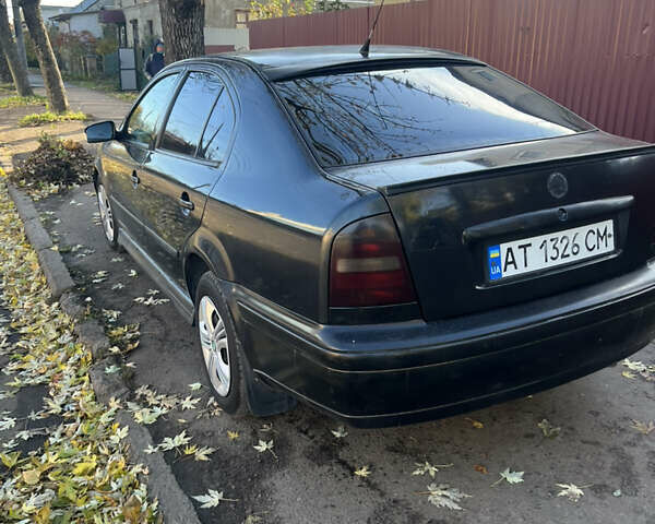 Черный Шкода Октавия, объемом двигателя 1.6 л и пробегом 200 тыс. км за 2300 $, фото 3 на Automoto.ua