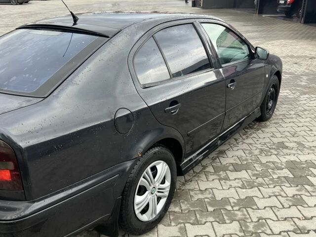 Чорний Шкода Октавія, об'ємом двигуна 1.6 л та пробігом 160 тис. км за 1700 $, фото 5 на Automoto.ua