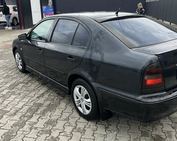 Черный Шкода Октавия, объемом двигателя 1.6 л и пробегом 161 тыс. км за 2700 $, фото 3 на Automoto.ua