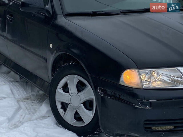 Черный Шкода Октавия, объемом двигателя 1.6 л и пробегом 250 тыс. км за 1850 $, фото 17 на Automoto.ua