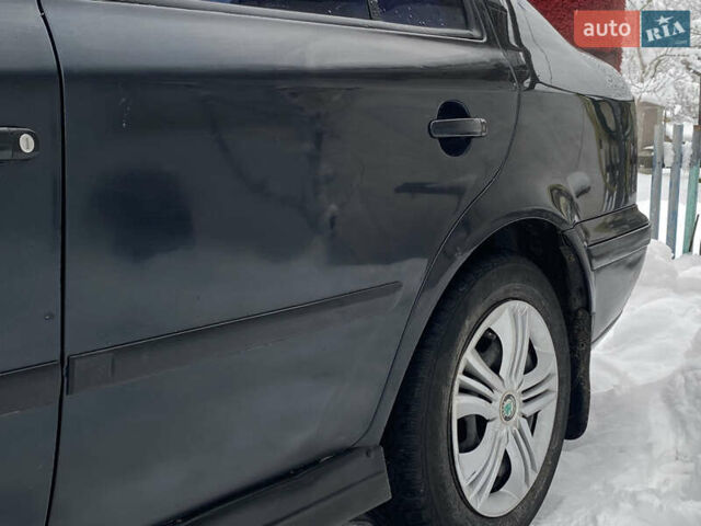 Черный Шкода Октавия, объемом двигателя 1.6 л и пробегом 250 тыс. км за 1850 $, фото 7 на Automoto.ua