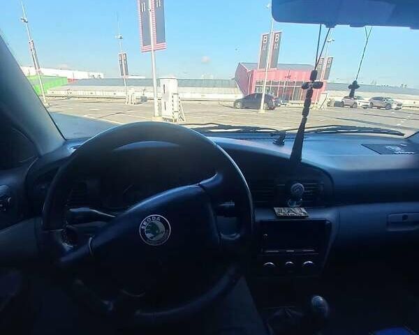 Черный Шкода Октавия, объемом двигателя 1.6 л и пробегом 290 тыс. км за 3999 $, фото 11 на Automoto.ua