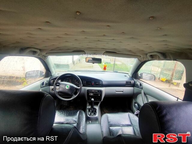 Черный Шкода Октавия, объемом двигателя 1.6 л и пробегом 300 тыс. км за 2800 $, фото 4 на Automoto.ua