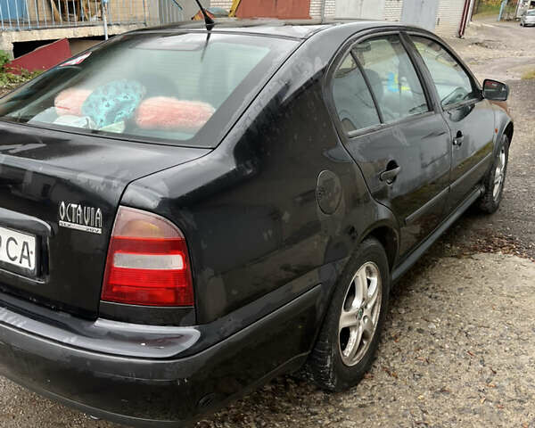 Чорний Шкода Октавія, об'ємом двигуна 1.8 л та пробігом 199 тис. км за 3100 $, фото 1 на Automoto.ua