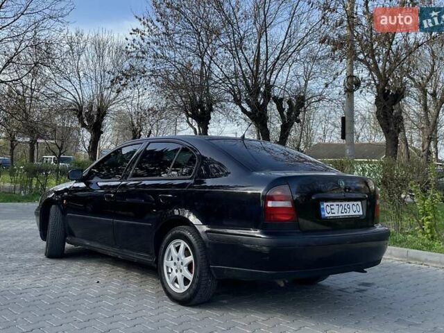 Черный Шкода Октавия, объемом двигателя 1.78 л и пробегом 250 тыс. км за 5500 $, фото 2 на Automoto.ua