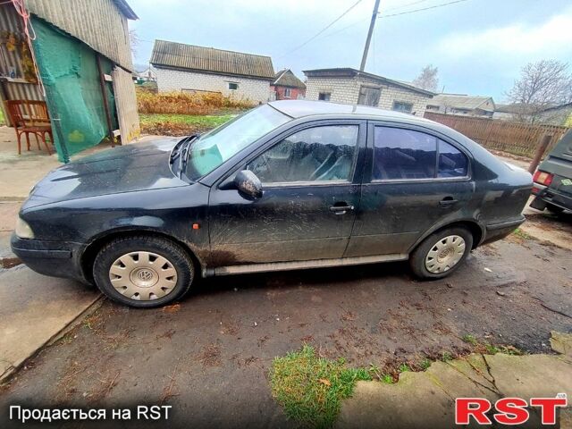 Черный Шкода Октавия, объемом двигателя 1.6 л и пробегом 300 тыс. км за 2800 $, фото 1 на Automoto.ua