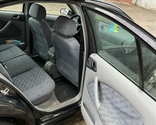 Чорний Шкода Октавія, об'ємом двигуна 1.8 л та пробігом 199 тис. км за 3100 $, фото 9 на Automoto.ua