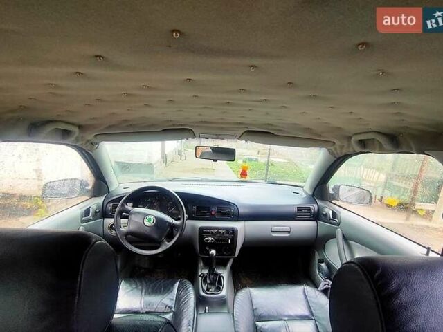 Черный Шкода Октавия, объемом двигателя 1.6 л и пробегом 300 тыс. км за 2800 $, фото 3 на Automoto.ua