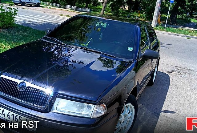 Черный Шкода Октавия, объемом двигателя 1.6 л и пробегом 266 тыс. км за 4200 $, фото 7 на Automoto.ua