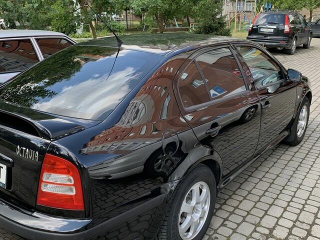 Чорний Шкода Октавія, об'ємом двигуна 2 л та пробігом 235 тис. км за 4500 $, фото 1 на Automoto.ua