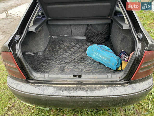 Черный Шкода Октавия, объемом двигателя 1.78 л и пробегом 360 тыс. км за 4600 $, фото 10 на Automoto.ua