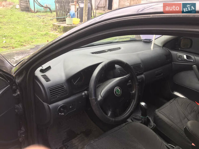 Черный Шкода Октавия, объемом двигателя 1.9 л и пробегом 293 тыс. км за 3800 $, фото 2 на Automoto.ua