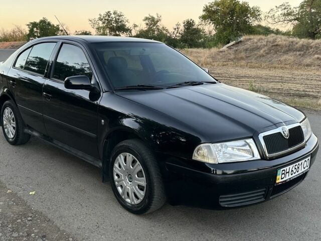 Черный Шкода Октавия, объемом двигателя 2 л и пробегом 260 тыс. км за 4800 $, фото 1 на Automoto.ua