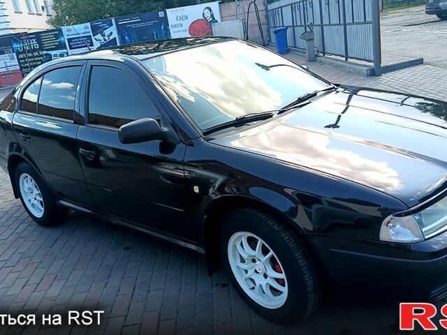 Черный Шкода Октавия, объемом двигателя 1.6 л и пробегом 266 тыс. км за 4200 $, фото 10 на Automoto.ua