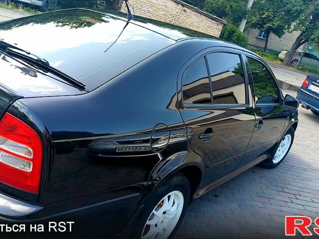 Черный Шкода Октавия, объемом двигателя 1.6 л и пробегом 266 тыс. км за 4200 $, фото 11 на Automoto.ua