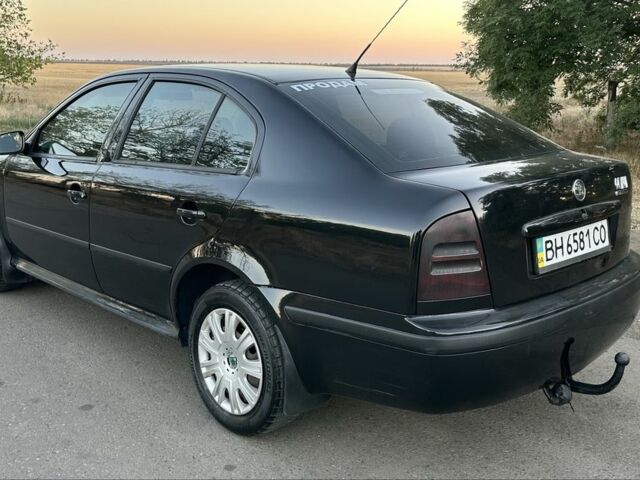 Черный Шкода Октавия, объемом двигателя 2 л и пробегом 260 тыс. км за 4800 $, фото 2 на Automoto.ua