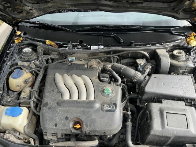 Чорний Шкода Октавія, об'ємом двигуна 2 л та пробігом 235 тис. км за 4500 $, фото 14 на Automoto.ua