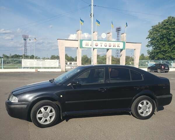 Черный Шкода Октавия, объемом двигателя 1.6 л и пробегом 380 тыс. км за 4000 $, фото 13 на Automoto.ua