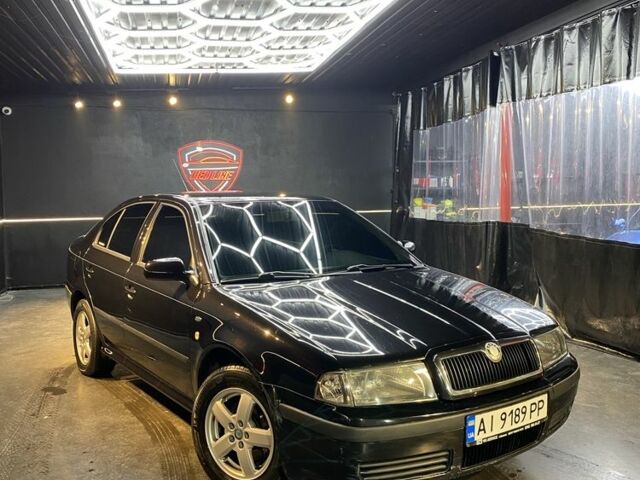 Черный Шкода Октавия, объемом двигателя 2 л и пробегом 401 тыс. км за 4400 $, фото 1 на Automoto.ua