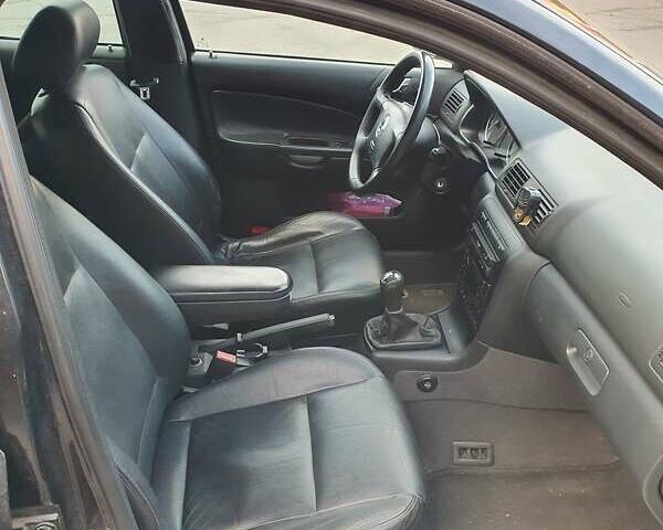 Черный Шкода Октавия, объемом двигателя 1.8 л и пробегом 281 тыс. км за 5500 $, фото 7 на Automoto.ua