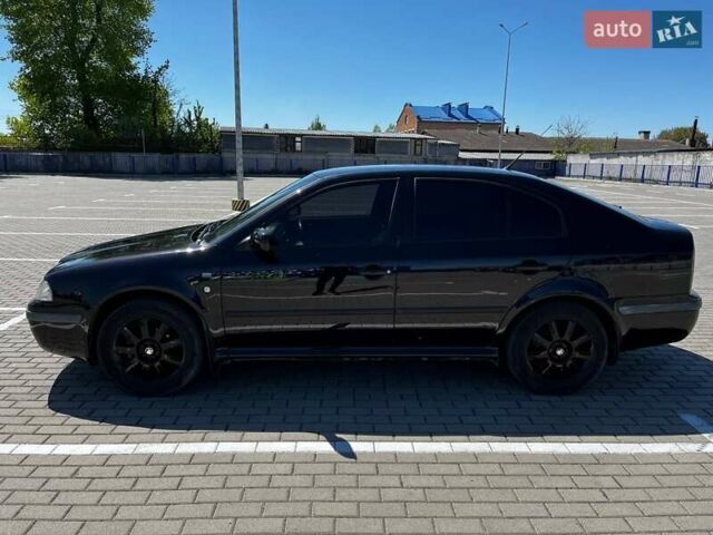 Черный Шкода Октавия, объемом двигателя 1.6 л и пробегом 225 тыс. км за 4500 $, фото 3 на Automoto.ua