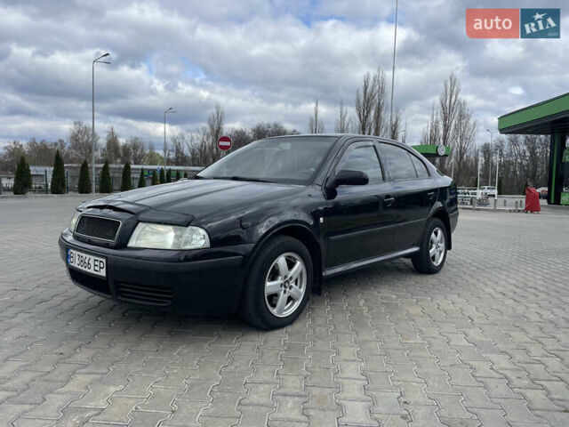 Черный Шкода Октавия, объемом двигателя 2 л и пробегом 261 тыс. км за 6000 $, фото 1 на Automoto.ua