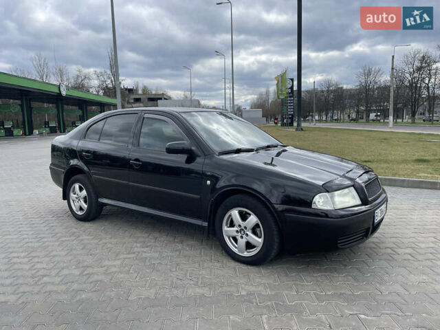 Черный Шкода Октавия, объемом двигателя 2 л и пробегом 261 тыс. км за 6000 $, фото 4 на Automoto.ua