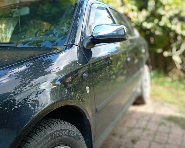 Шкода Октавия 2003 в Славянске на Automoto.ua Черный Шкода Октавия, объемом двигателя 2 л и пробегом 245 тыс. км за 5200 $, фото 3 на Automoto.ua