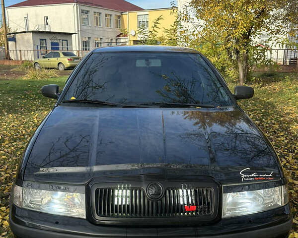 Черный Шкода Октавия, объемом двигателя 1.6 л и пробегом 350 тыс. км за 4200 $, фото 1 на Automoto.ua